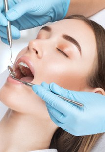 a woman patient undergoing a dental checkup near Mandarin