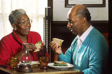 older people eating with dentures